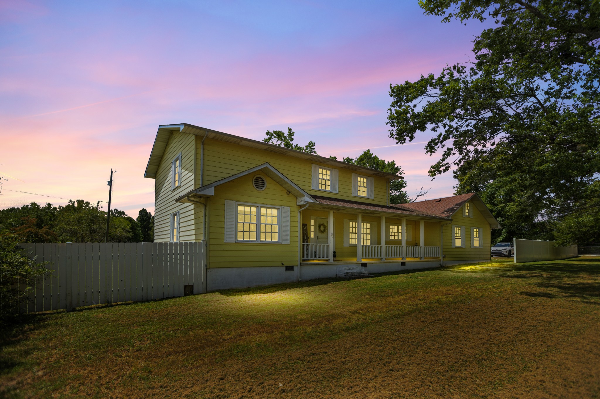 1840 Lockmiller Road Estill Springs, TN 37330 - Photo 3 of 71 a front view of a house with a garden