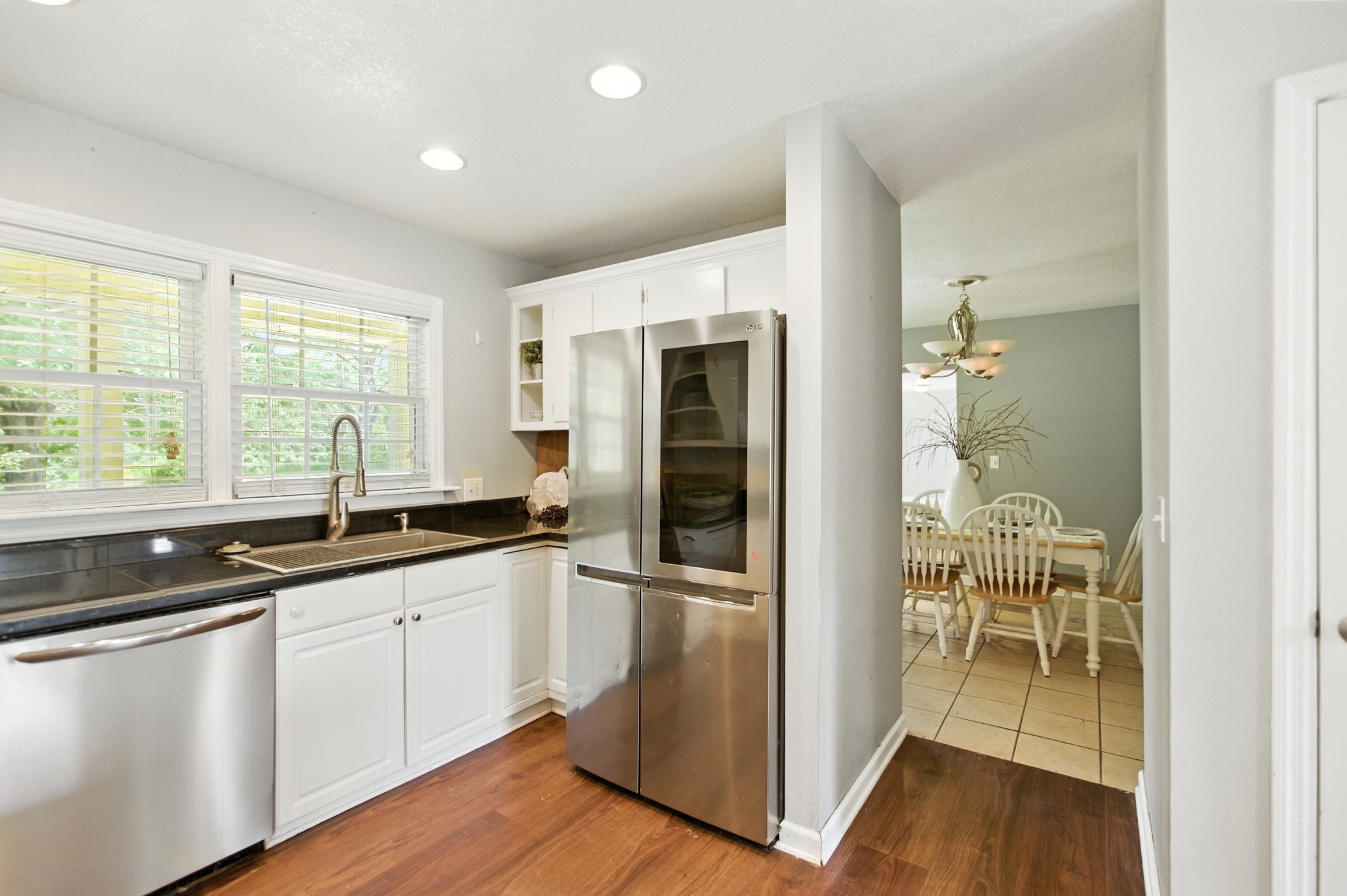 1840 Lockmiller Road Estill Springs, TN 37330 - Photo 34 of 71 a kitchen with stainless steel appliances granite countertop a refrigerator and a sink