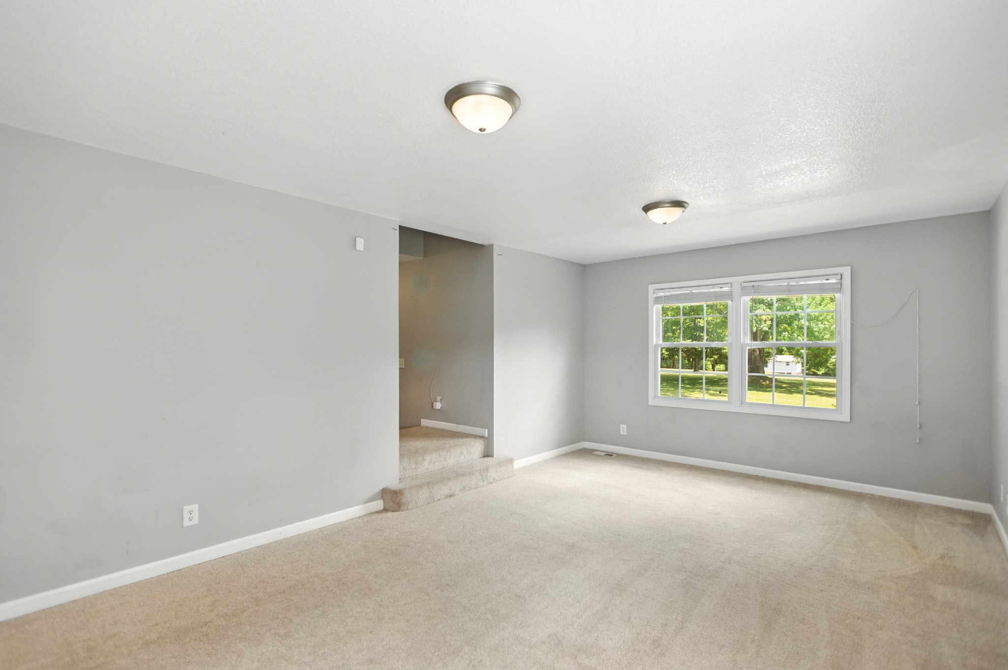 1840 Lockmiller Road Estill Springs, TN 37330 - Photo 39 of 71 a view of an empty room with a window
