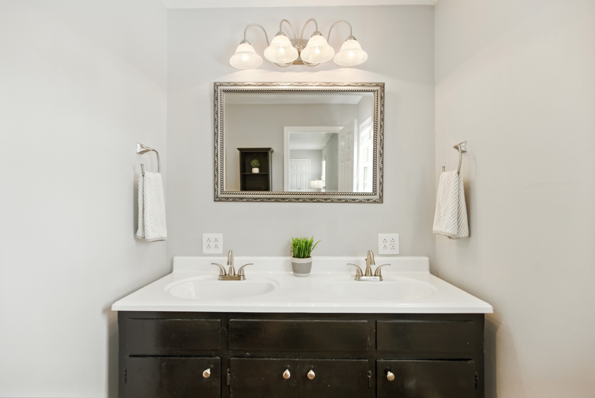 1840 Lockmiller Road Estill Springs, TN 37330 - Photo 49 of 71 a bathroom with a sink vanity and a mirror