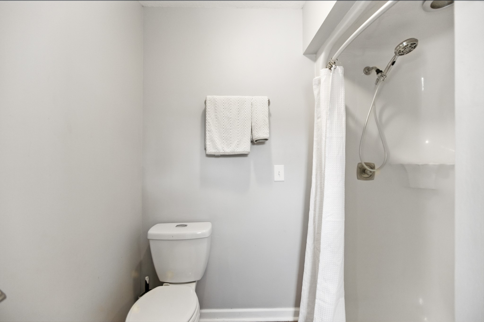 1840 Lockmiller Road Estill Springs, TN 37330 - Photo 51 of 71 a white toilet sitting next to a bathroom sink