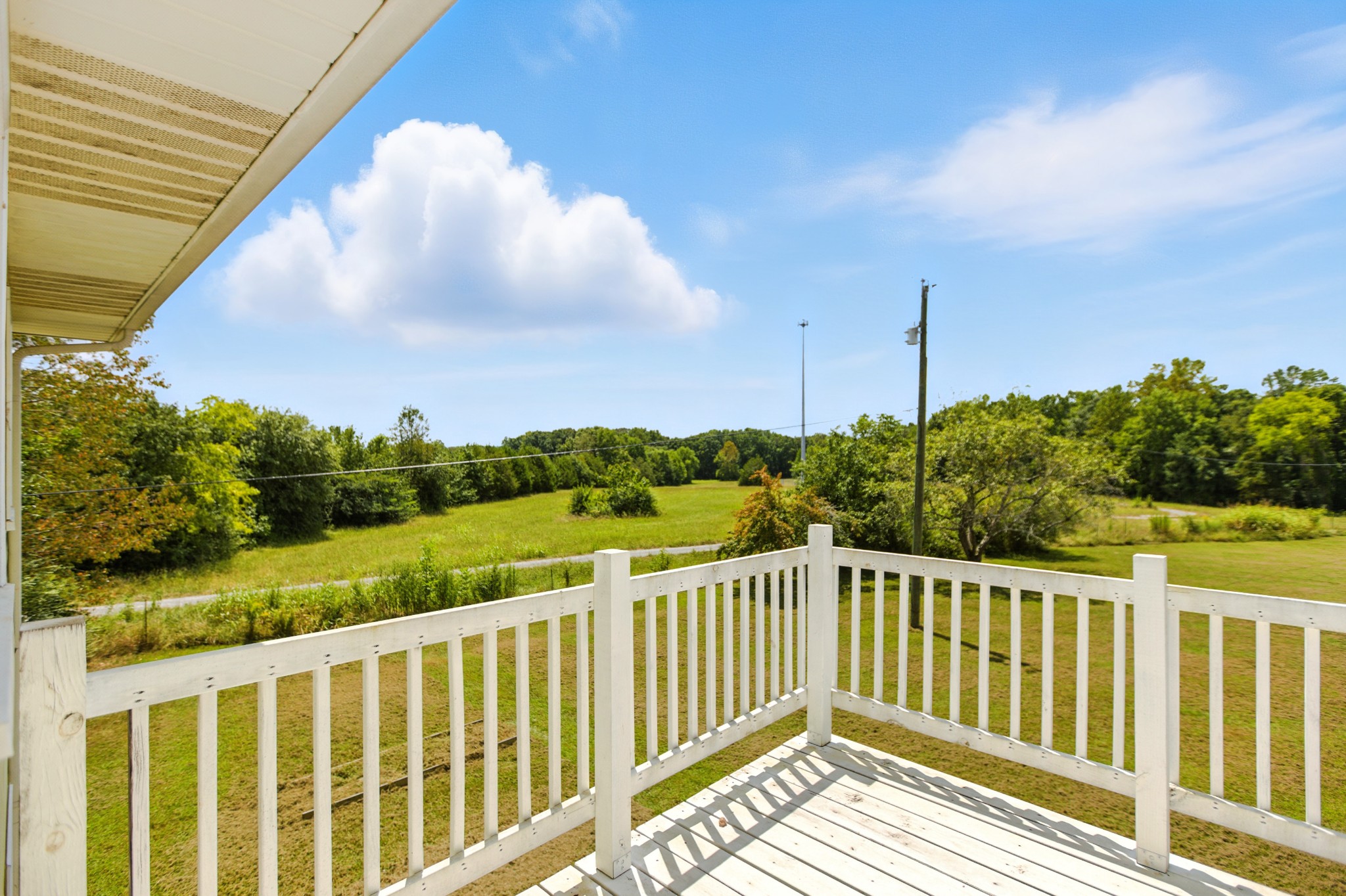 1840 Lockmiller Road Estill Springs, TN 37330 - Photo 54 of 71 a view of a two chair in the balcony