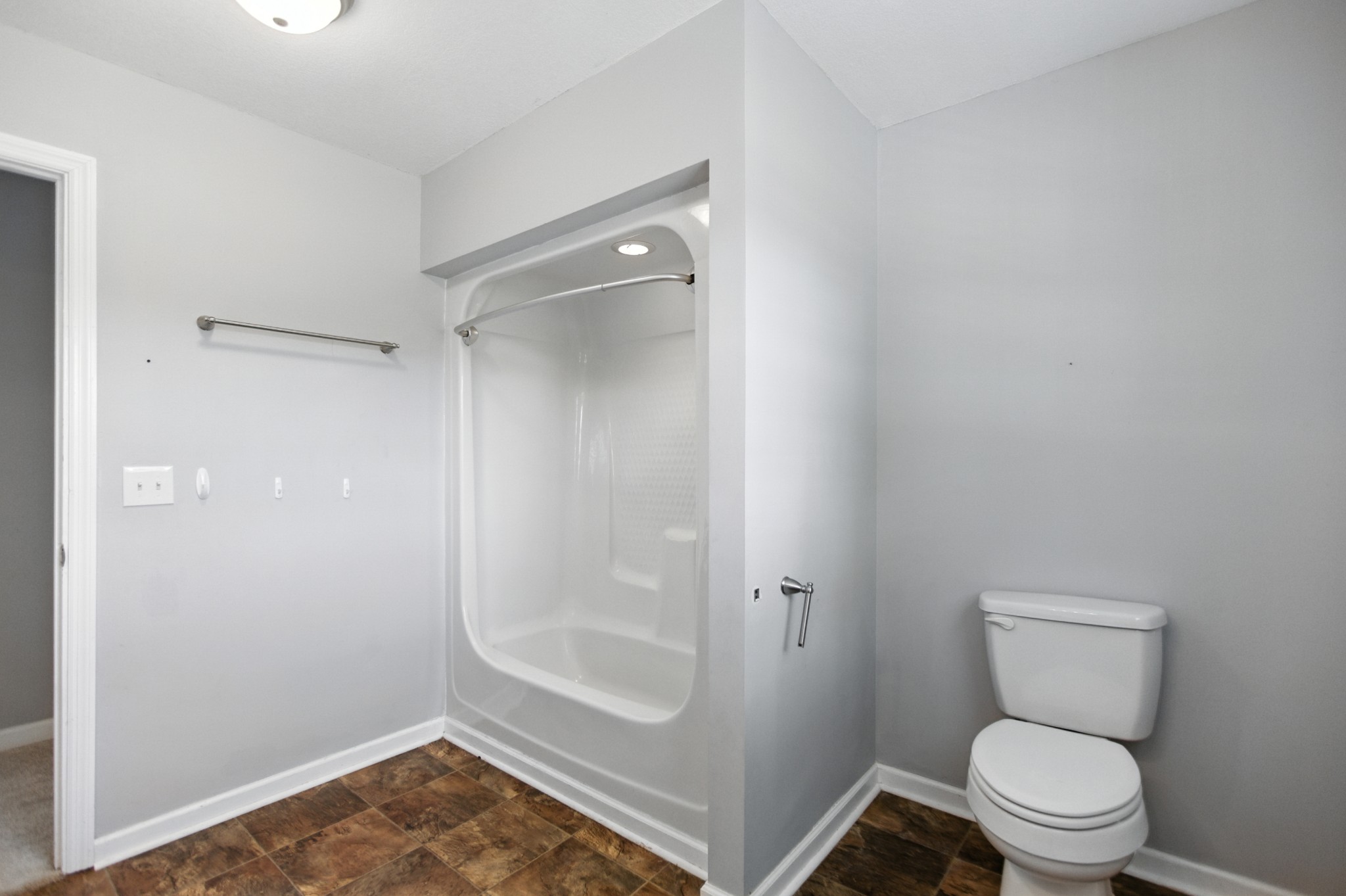 1840 Lockmiller Road Estill Springs, TN 37330 - Photo 59 of 71 a bathroom with a toilet and a shower