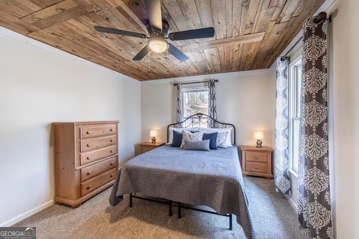 68 Franklin Road Eatonton, GA 31024 - Photo 22 of 28 a bedroom with a bed and a tv
