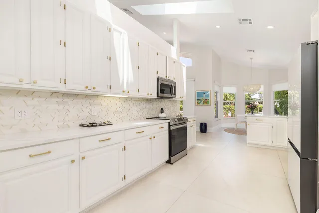 a view of a backyard with sitting area