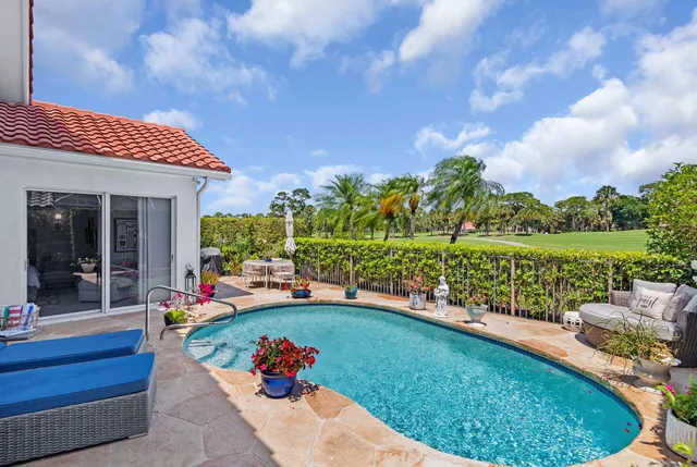 a view of a backyard with a garden