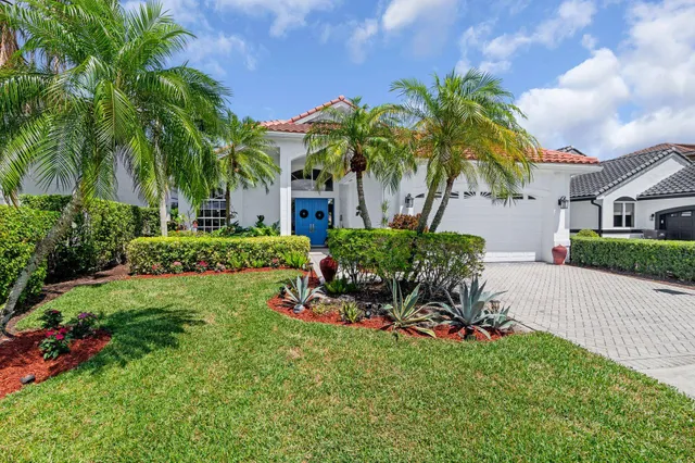 a aerial view of a house with garden space and street view