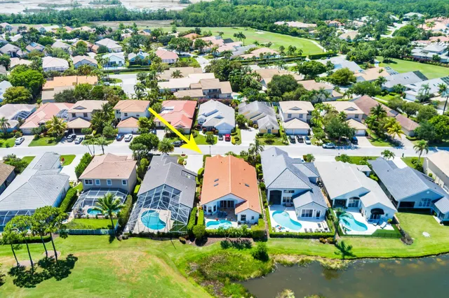 a sign that is in front of flowers