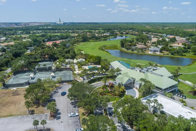 a view of front door and potted plants