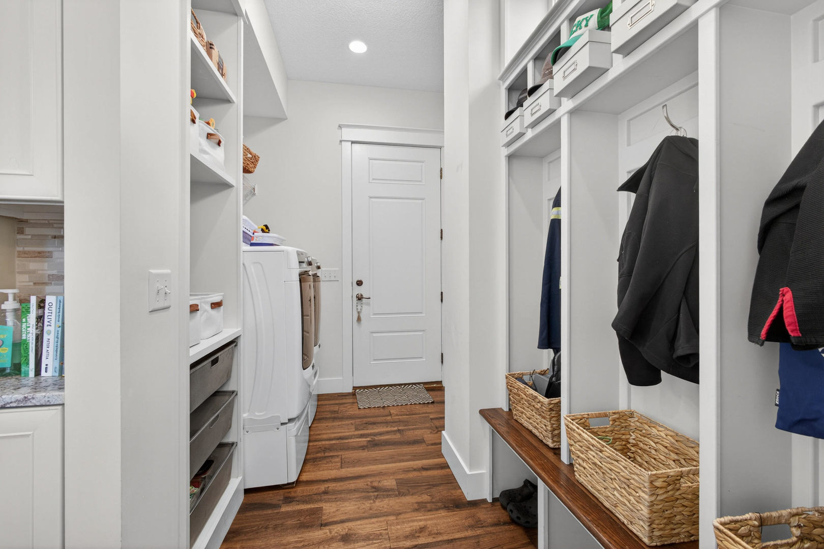 5700 Emily Road Bettendorf, IA 52722 - Photo 17 of 58 a view of walk in closet with clothes and shoes