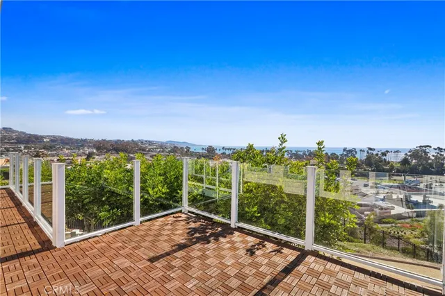 a view of a balcony with city view