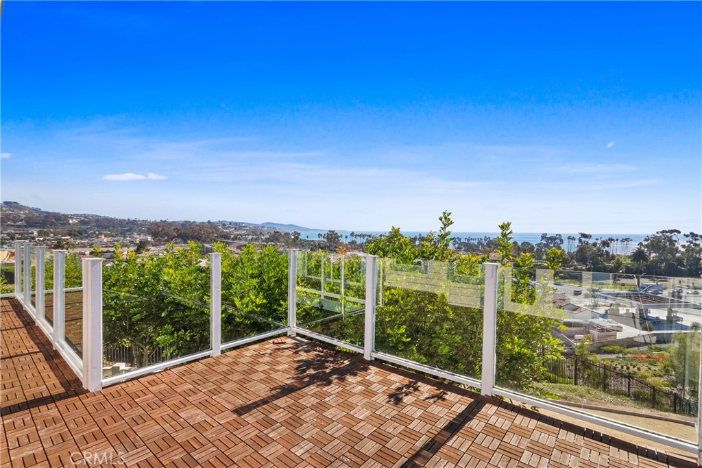 a view of a balcony with city view