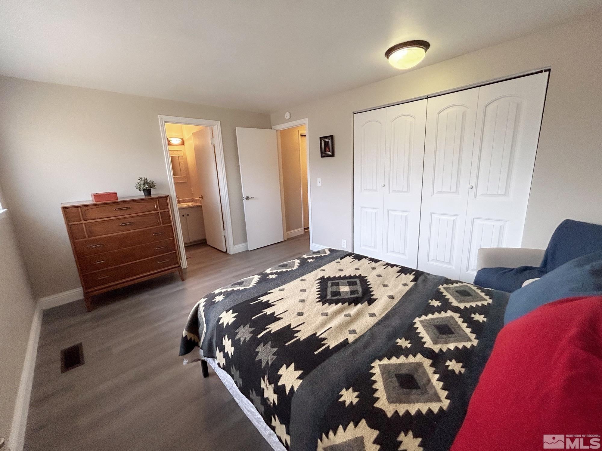 130 Ring Road Dayton, NV 89403 - Photo 14 of 21 a bedroom with a bed and a window