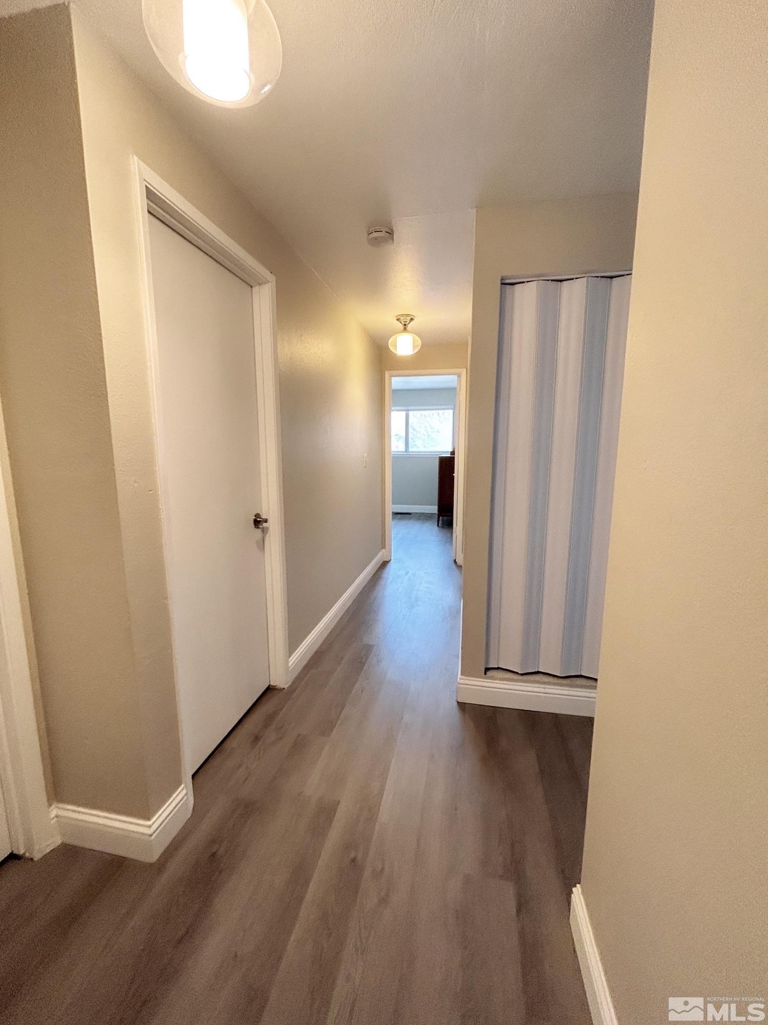 130 Ring Road Dayton, NV 89403 - Photo 8 of 21 a view of a room with wooden floor