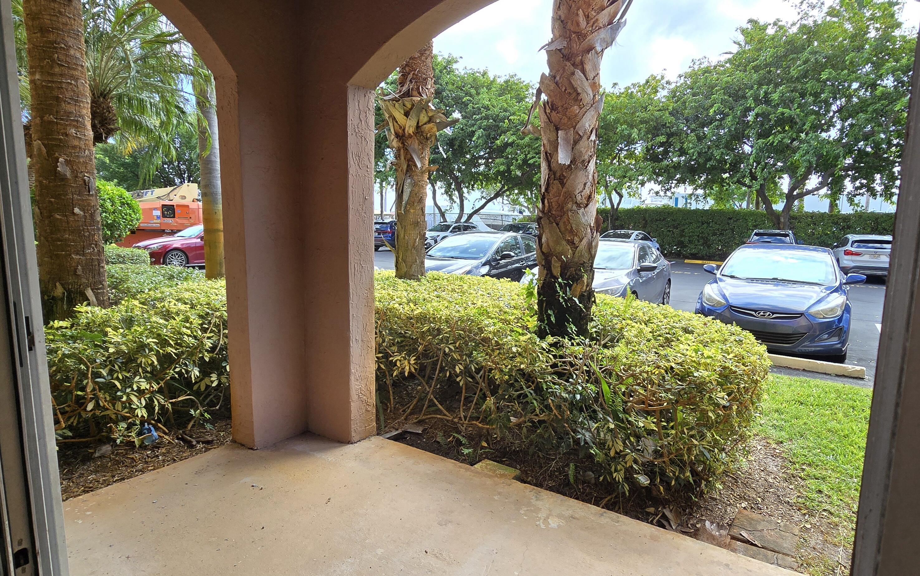 1000 Scotia Drive, Unit 106 Hypoluxo, FL 33462 - Photo 15 of 28 a view of a garden with plants