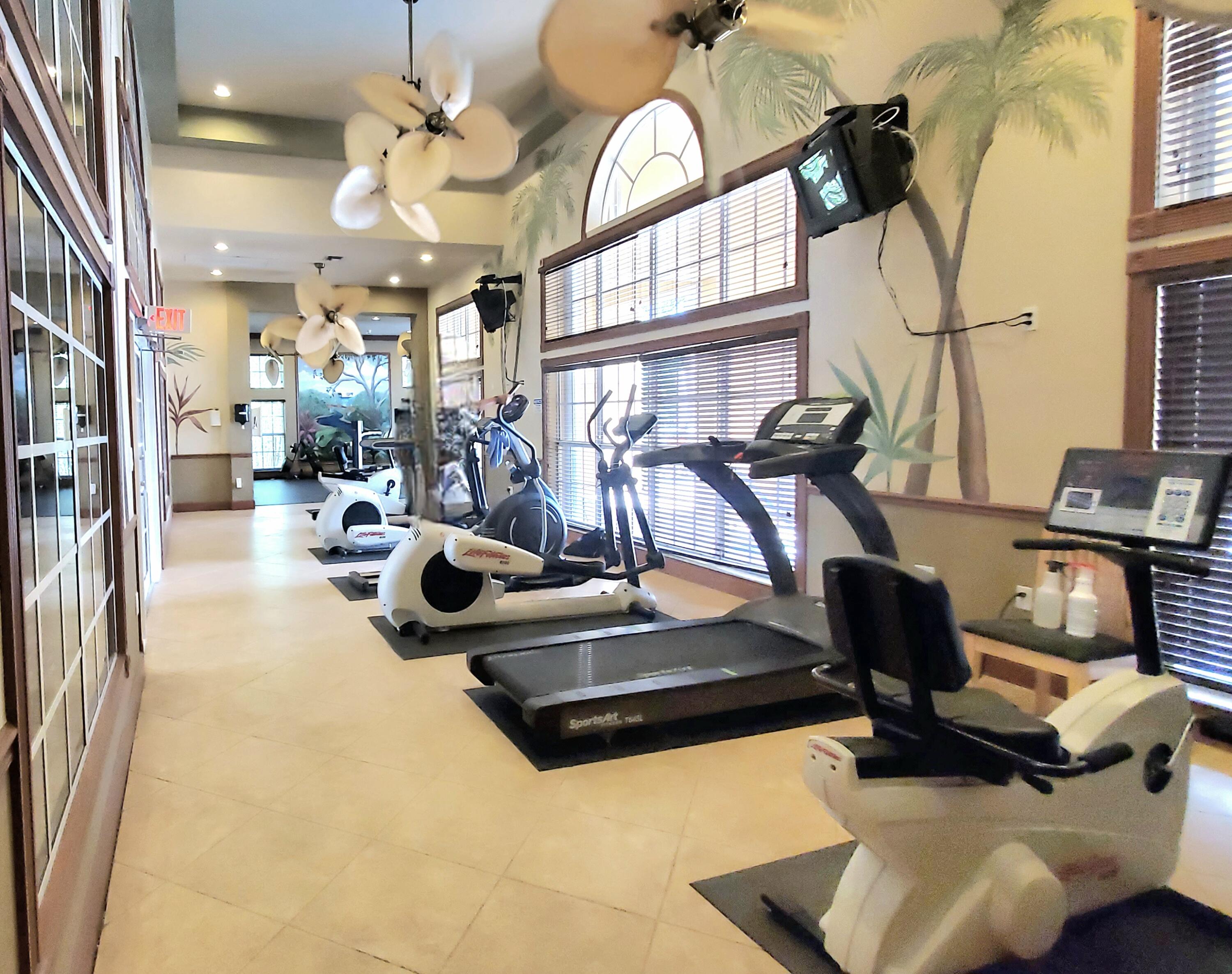 1000 Scotia Drive, Unit 106 Hypoluxo, FL 33462 - Photo 22 of 28 a view of a room with gym equipment