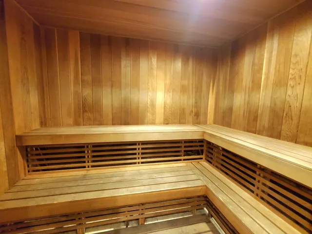 a view of swimming pool with chairs