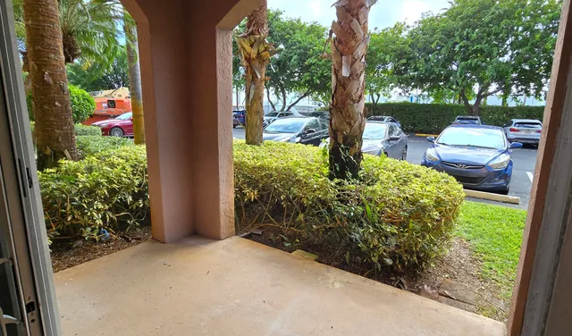 a backyard of a house with lots of green space