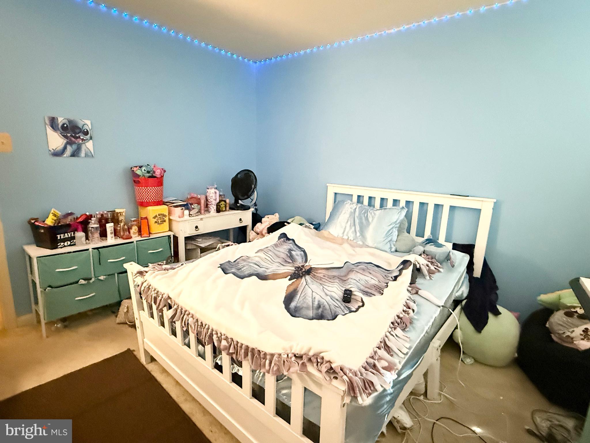 111 Martin Drive Hurlock, MD 21643 - Photo 22 of 27 a bedroom with a bed and a table in it