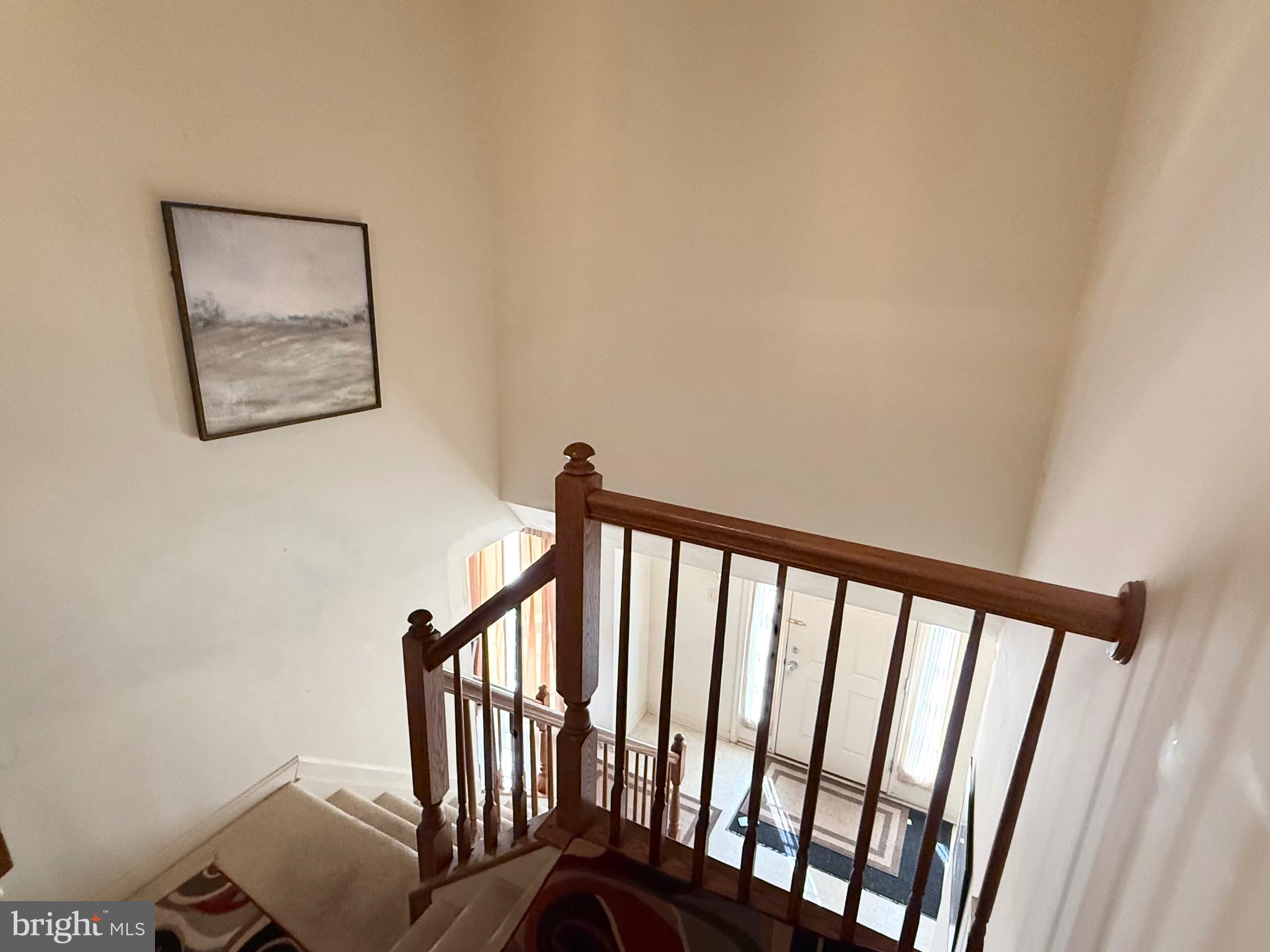 111 Martin Drive Hurlock, MD 21643 - Photo 24 of 27 a view of staircase with railing and white walls