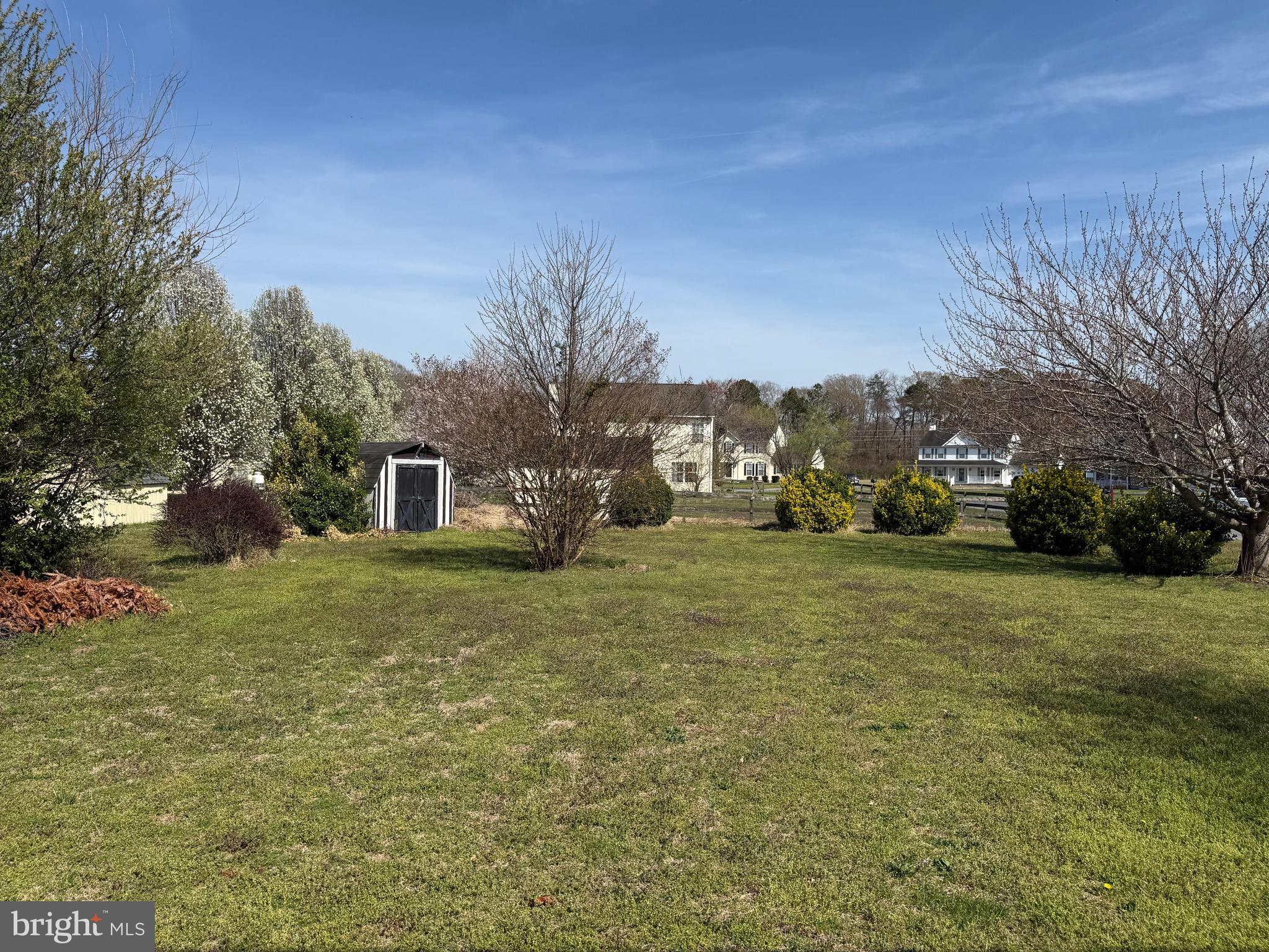 111 Martin Drive Hurlock, MD 21643 - Photo 26 of 27 a front view of a house with a yard