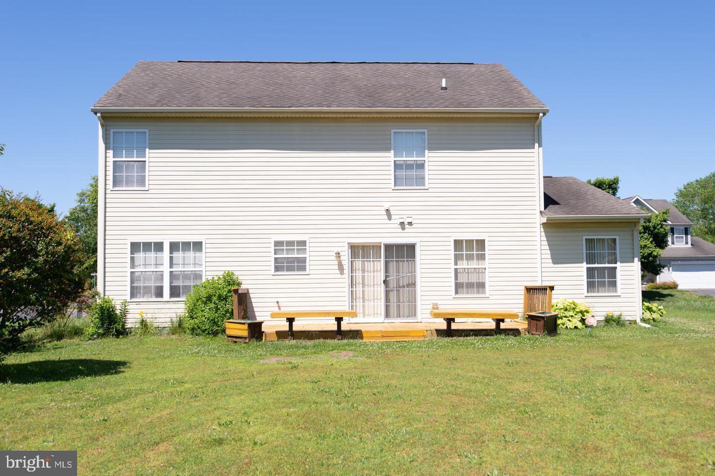 111 Martin Drive Hurlock, MD 21643 - Photo 5 of 27 a front view of house with outdoor seating