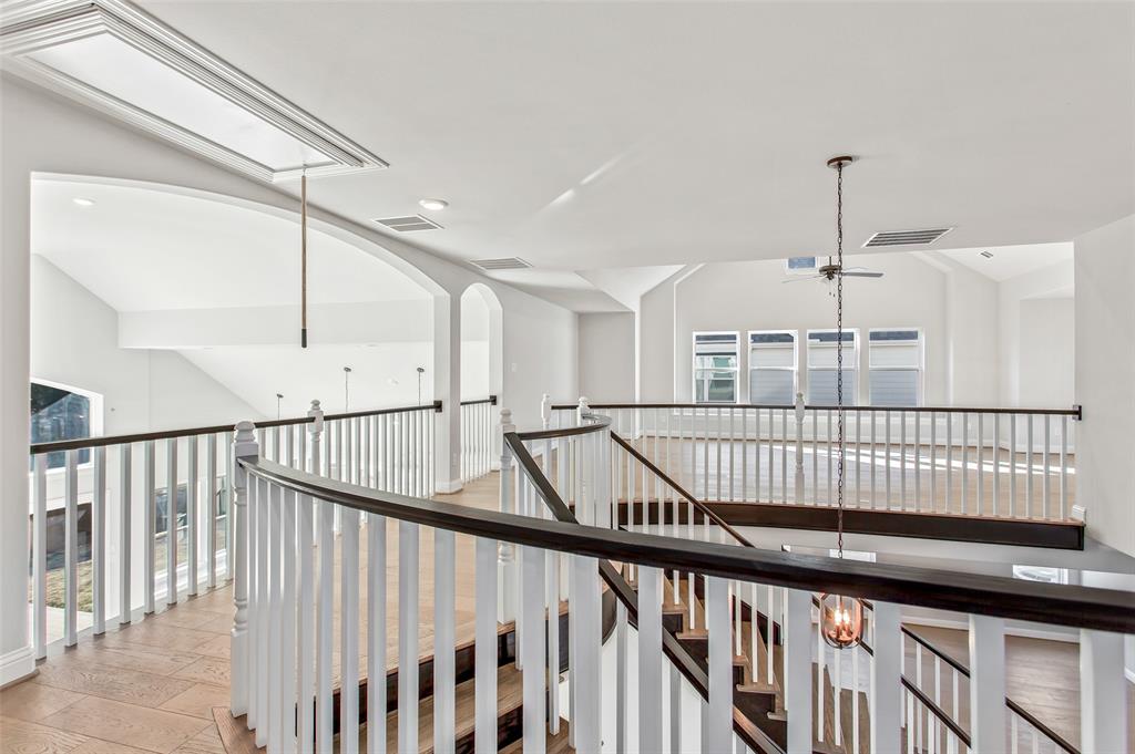 805 Veranda View McKinney, TX 75069 - Photo 27 of 40 a view of staircase with railing and white walls
