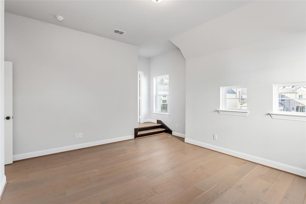 805 Veranda View McKinney, TX 75069 - Photo 32 of 40 an empty room with windows