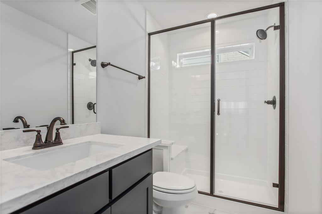 805 Veranda View McKinney, TX 75069 - Photo 34 of 40 a bathroom with a sink a toilet and shower