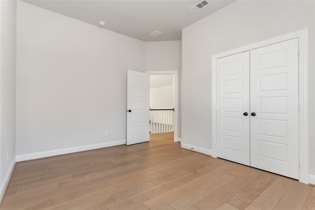 805 Veranda View McKinney, TX 75069 - Photo 36 of 40 wooden floor in an empty room