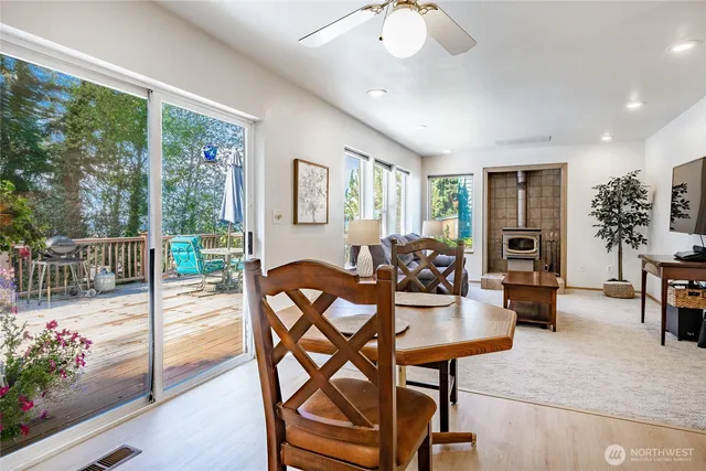 a view of a livingroom with furniture window and wooden floor