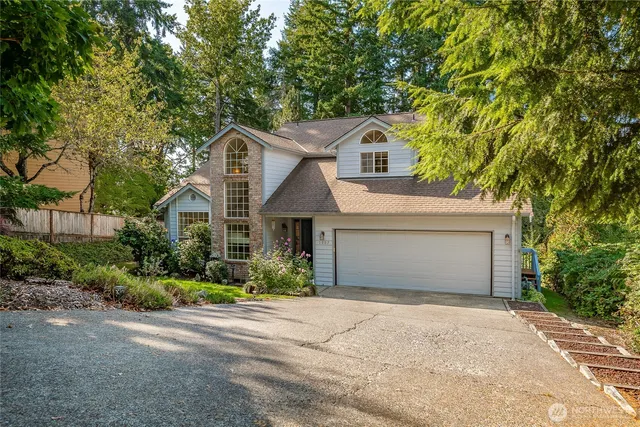 a view of a yard with trees