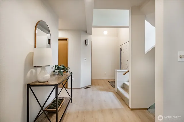 a room with a table and chairs