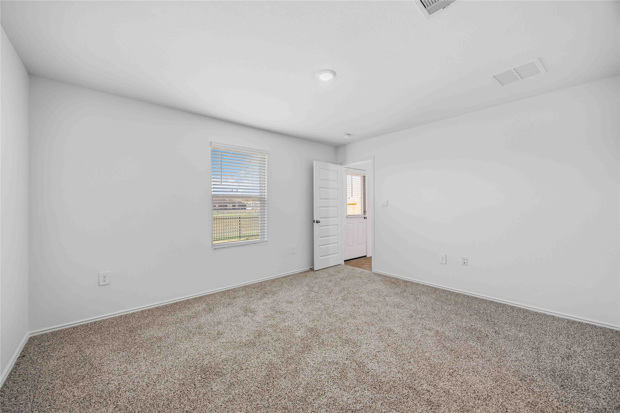 11913 Sweet Apple Lane Houston, TX 77048 - Photo 11 of 20 an empty room with windows