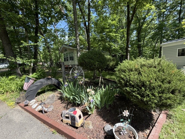 2795 East 28th Road Marseilles, IL 61341 - Photo 23 of 63 a view of a garden with a potted plants
