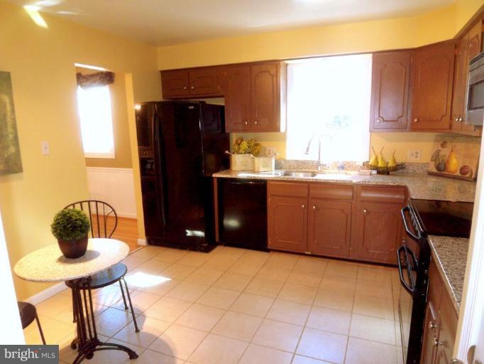 11413 Vale Road Oakton, VA 22124 - Photo 3 of 30 Spacious Kitch w/ table space, Tiling, Newer Appl