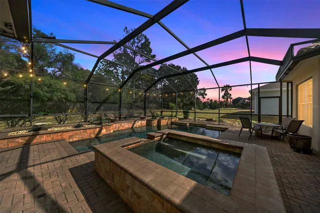 a view of a patio with swimming pool