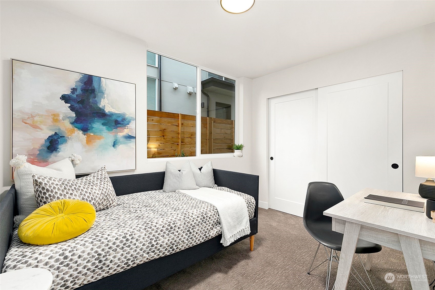 1609 South Washington Street Seattle, WA 98144 - Photo 11 of 14 a bedroom with a bed and a window