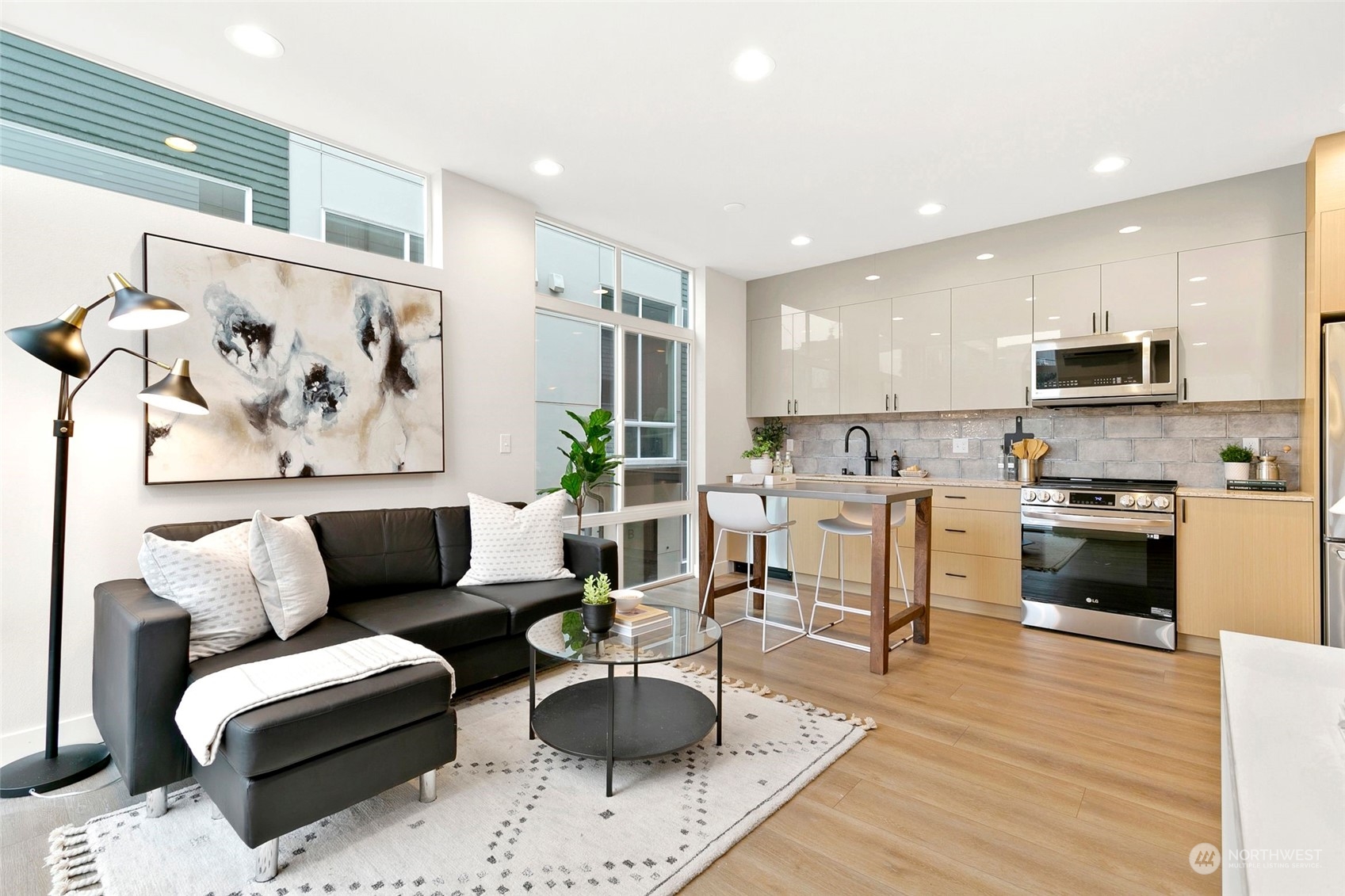 1609 South Washington Street Seattle, WA 98144 - Photo 2 of 14 a living room with furniture and kitchen view