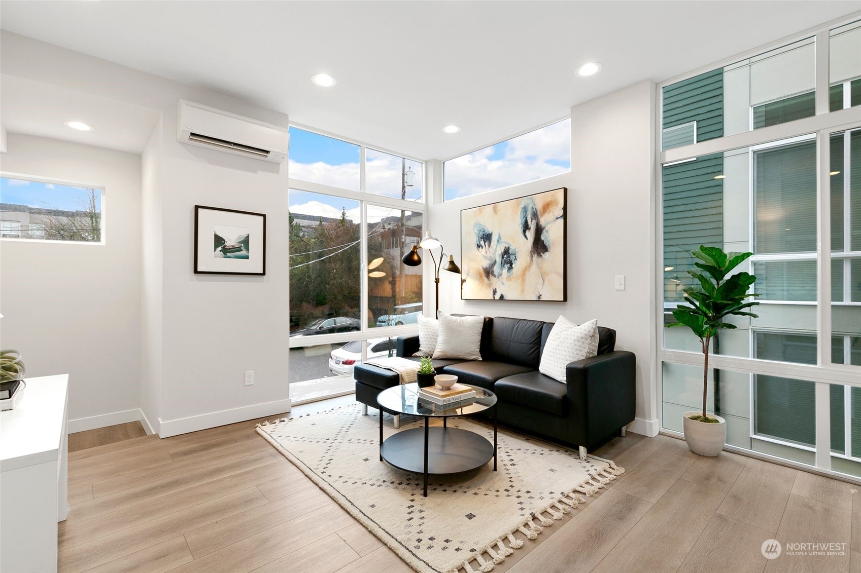 1609 South Washington Street Seattle, WA 98144 - Photo 4 of 14 a living room with furniture potted plant and a large window