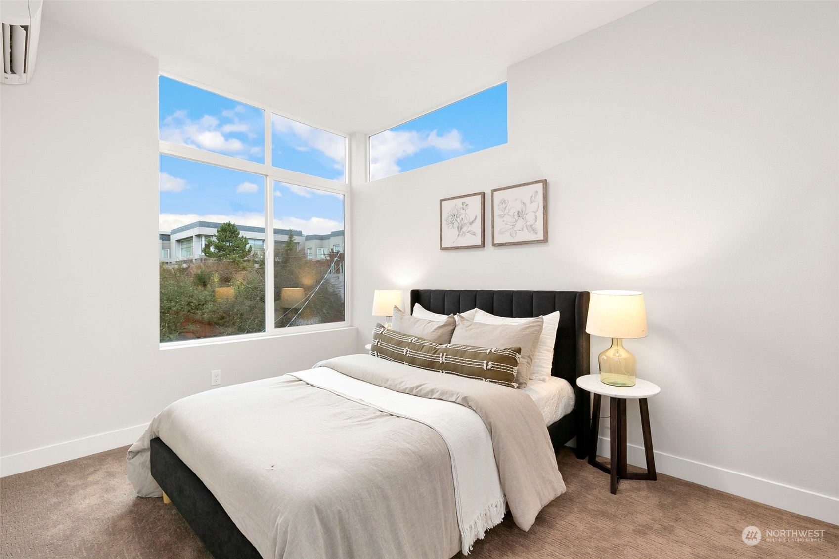 1609 South Washington Street Seattle, WA 98144 - Photo 9 of 14 a bedroom with a bed and a window