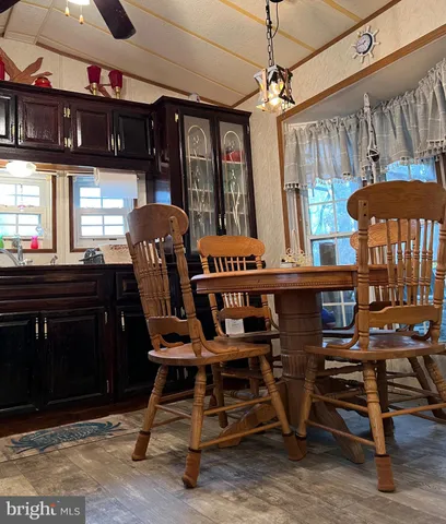 a kitchen with stainless steel appliances granite countertop a stove and a refrigerator