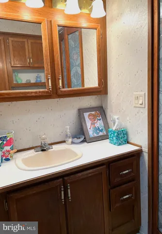 a view of a chairs and table on the wooden floor