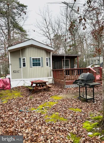 a view of a house with trees