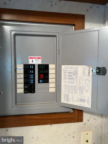 a view of a lake with houses in the back