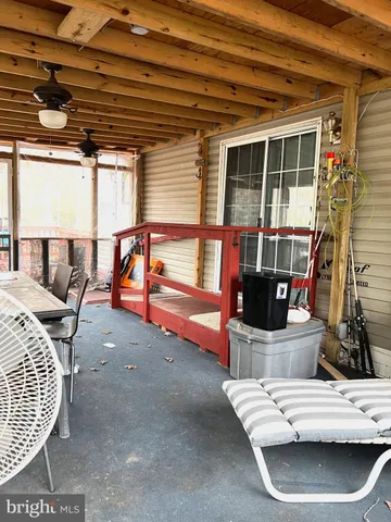 a view of a lake with houses in the background