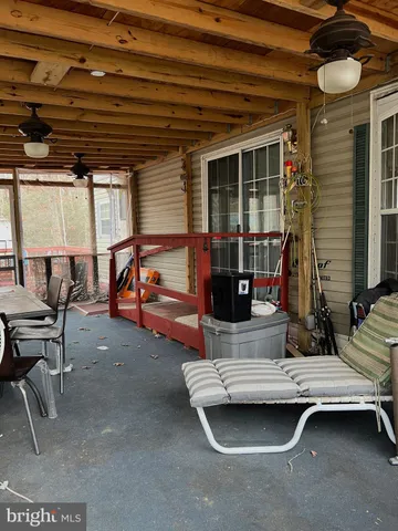 a view of a park with trees in the background