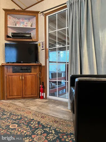 a view of a chairs and table in a room