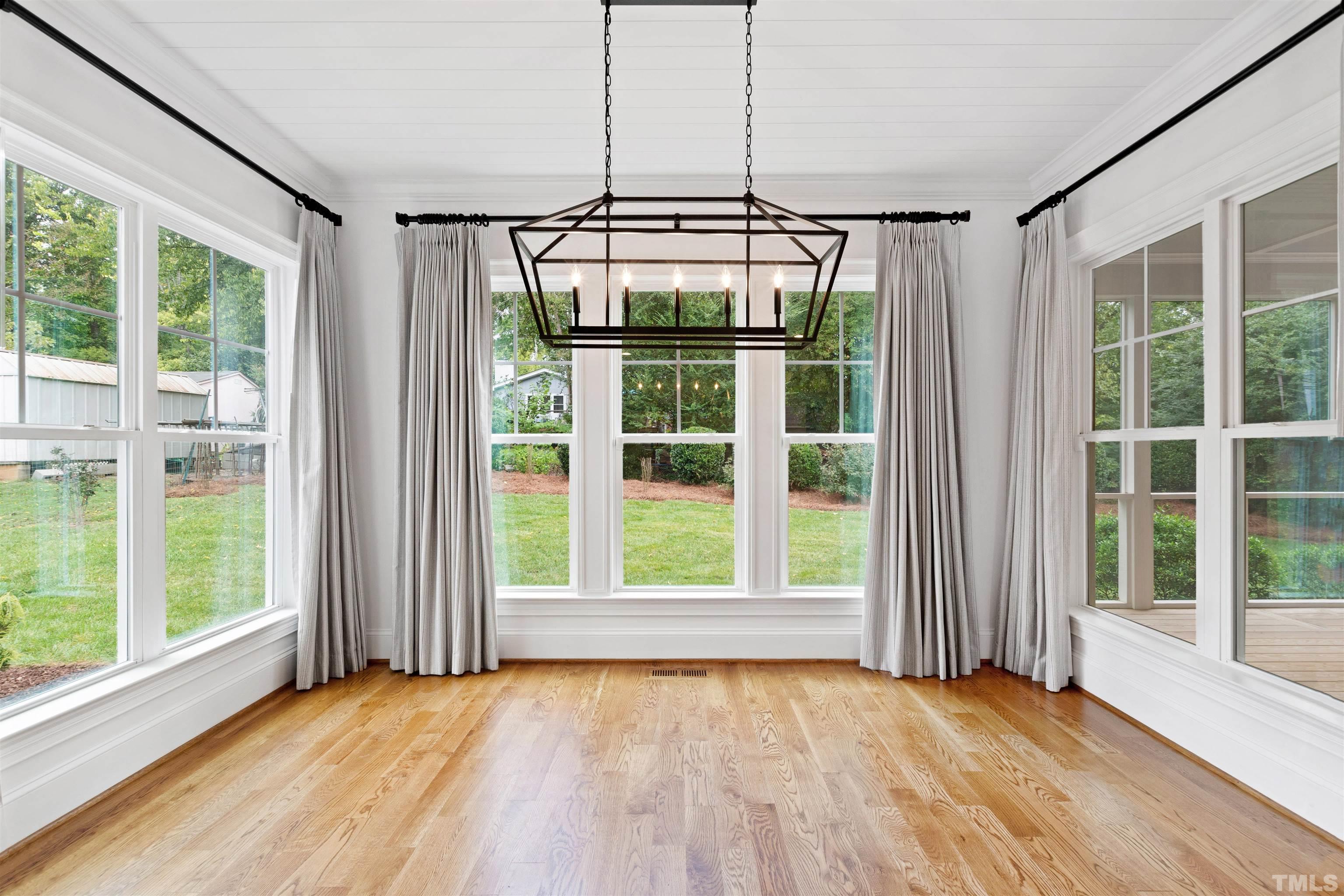 401 Latimer Road Raleigh, NC 27609 - Photo 12 of 45 a view of an empty room with a window