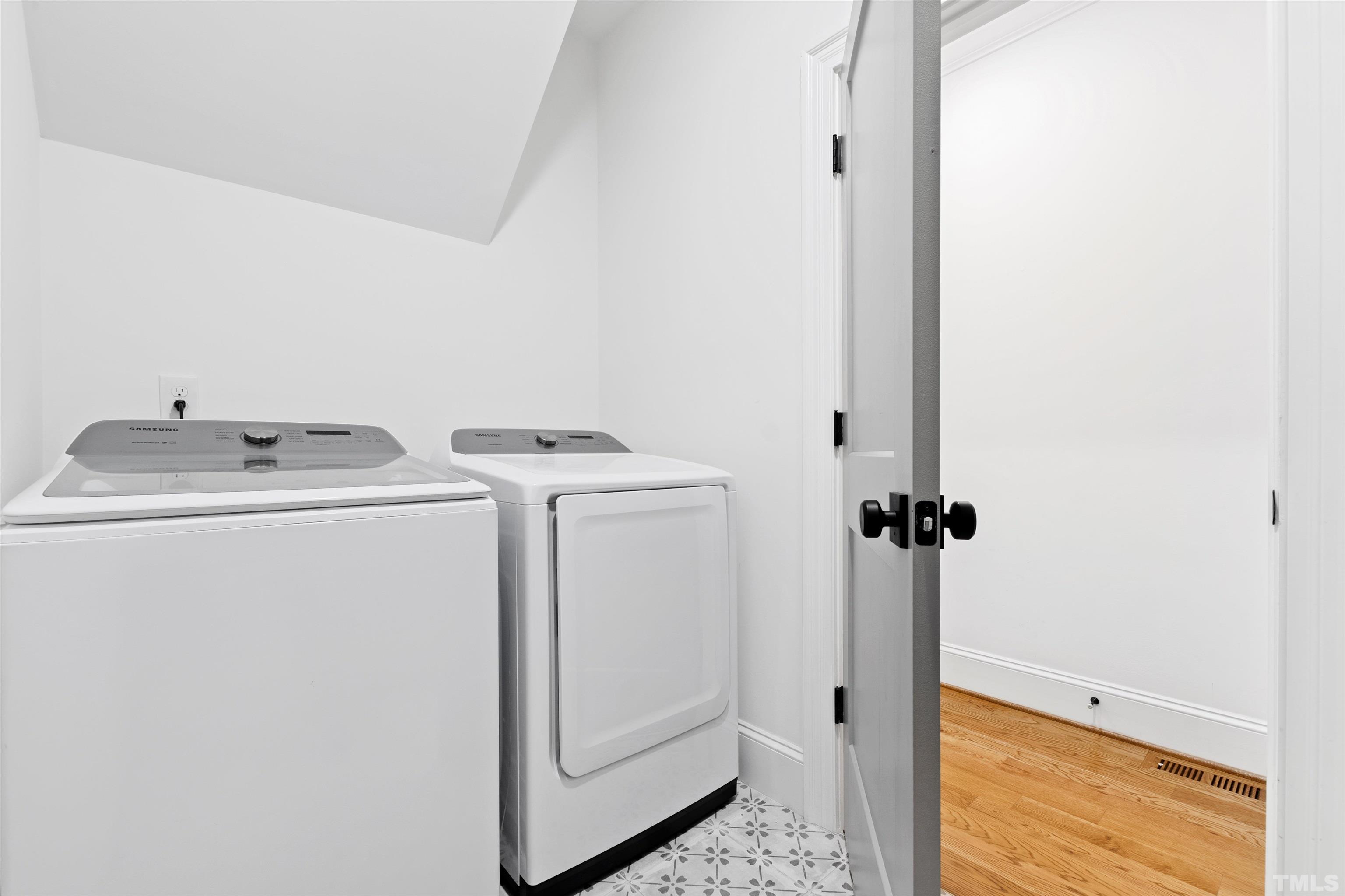 401 Latimer Road Raleigh, NC 27609 - Photo 20 of 45 a utility room with dryer and washer